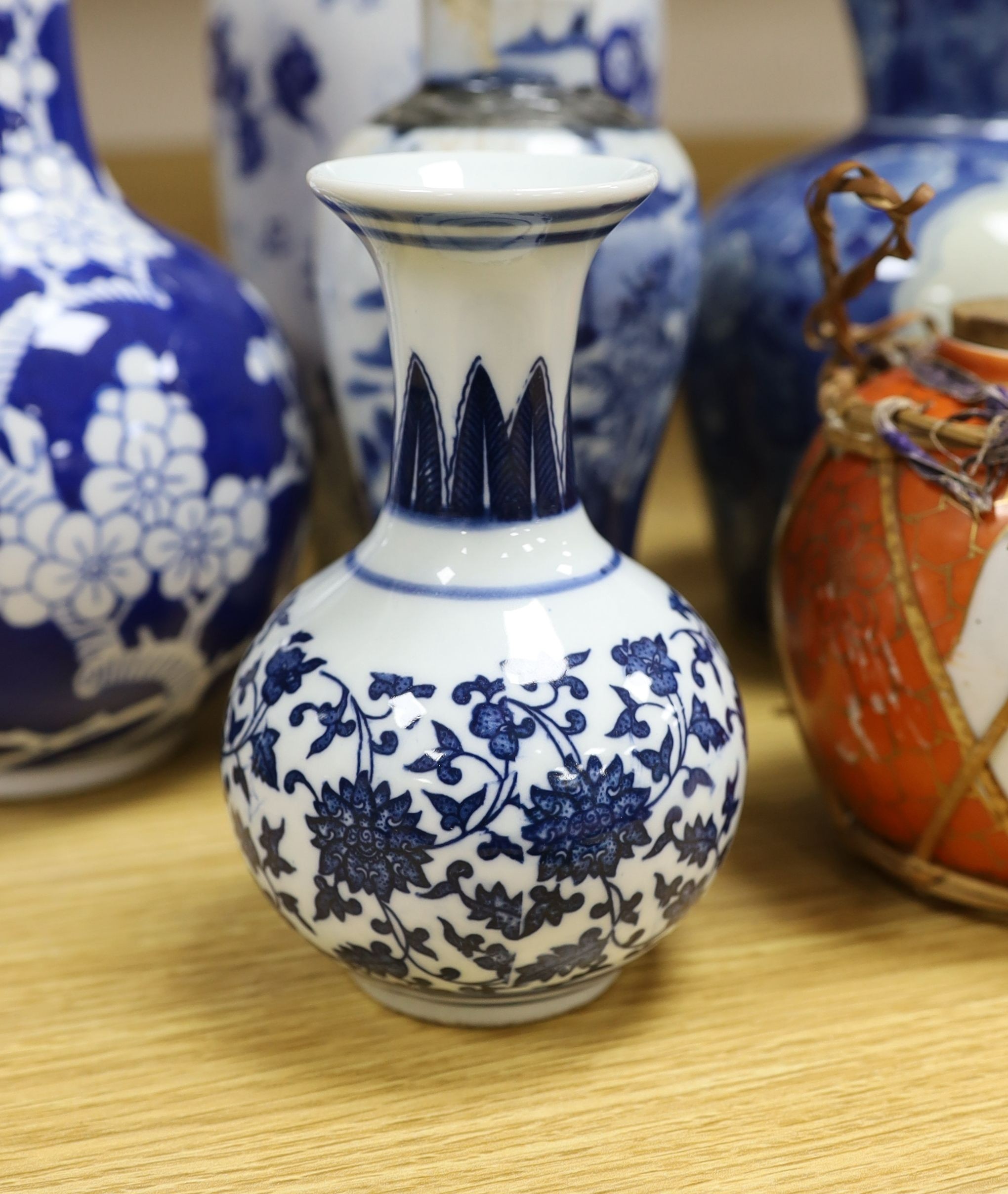 A group of Chinese blue and white porcelain including an early 20th century vase, tallest 28cm